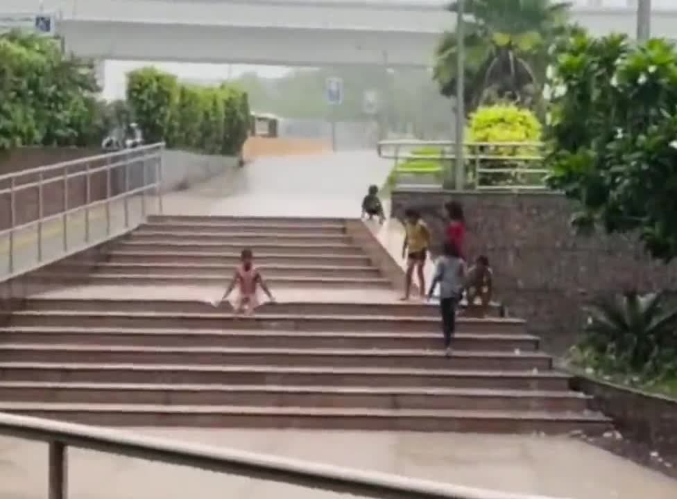 Video thumbnail for It's raining out here but these dudes are just enjoying life