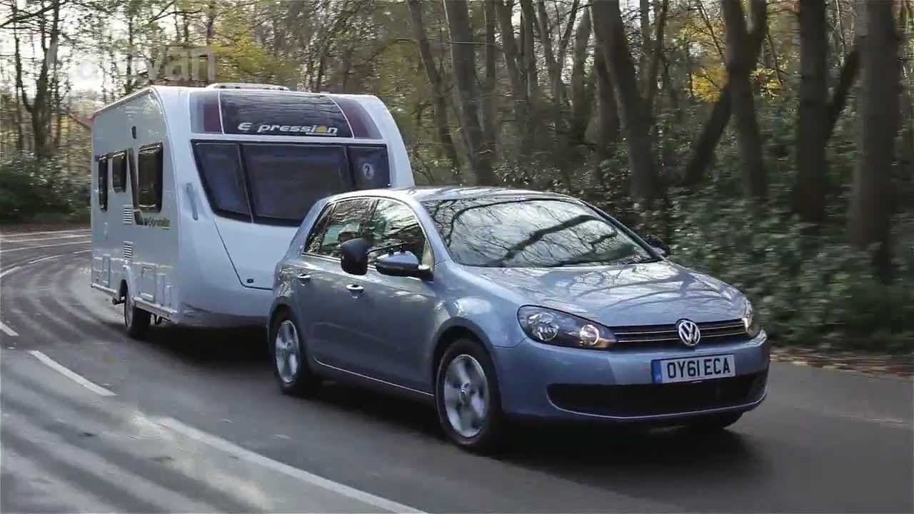 VW Golf towing a caravan