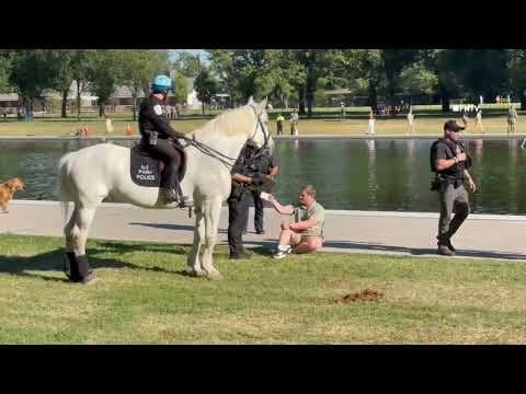 YouTube thumbnail for Detainement at Reflecting Pool - Citation for "putting hand in the water" - Washington DC