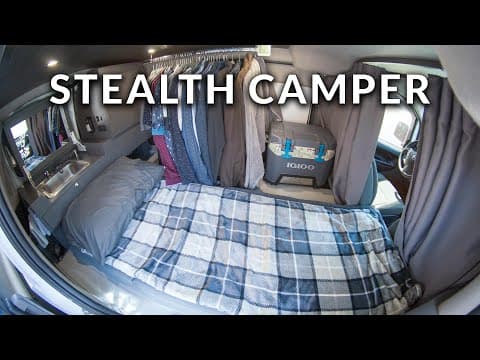 YouTube thumbnail for Ultimate Stealth Camper Van Tour | Nissan NV200 Self-Converted Build Walkthrough