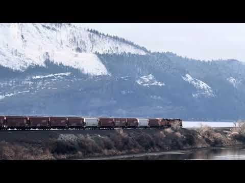 YouTube thumbnail for BNSF hauling grain cars through a snowy a Columbia River Gorge