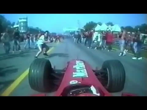 YouTube thumbnail for Schumacher somehow avoids hitting fans after track invasion (Italy, 2000)