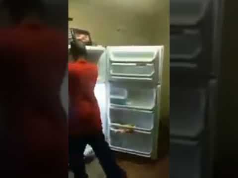 YouTube thumbnail for drunk guy tries to fight his fridge and loses