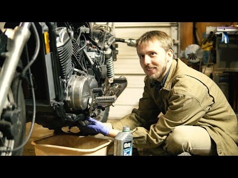 YouTube thumbnail for Guy takes*seventeen* shots before demonstrating how to change motorcycle sparks and oil