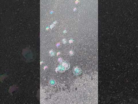 YouTube thumbnail for Why do these bubbles change colours before popping when they land in the wet patch on my driveway?