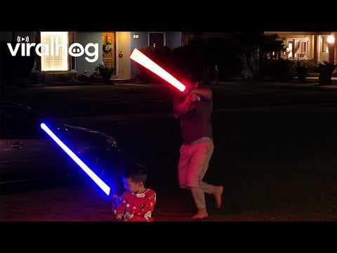 YouTube thumbnail for Dad Takes Lightsaber Duel a Bit Too Seriously || ViralHog