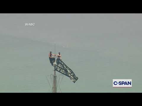 YouTube thumbnail for Masked Protesters Atop Empire State Building