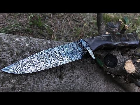 YouTube thumbnail for [14:59] Hand forging a Damascus knife