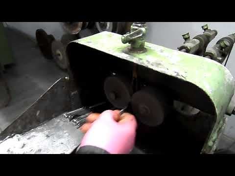 YouTube thumbnail for A video of Ern's "Hexe" machine to grind both sides of a razor
